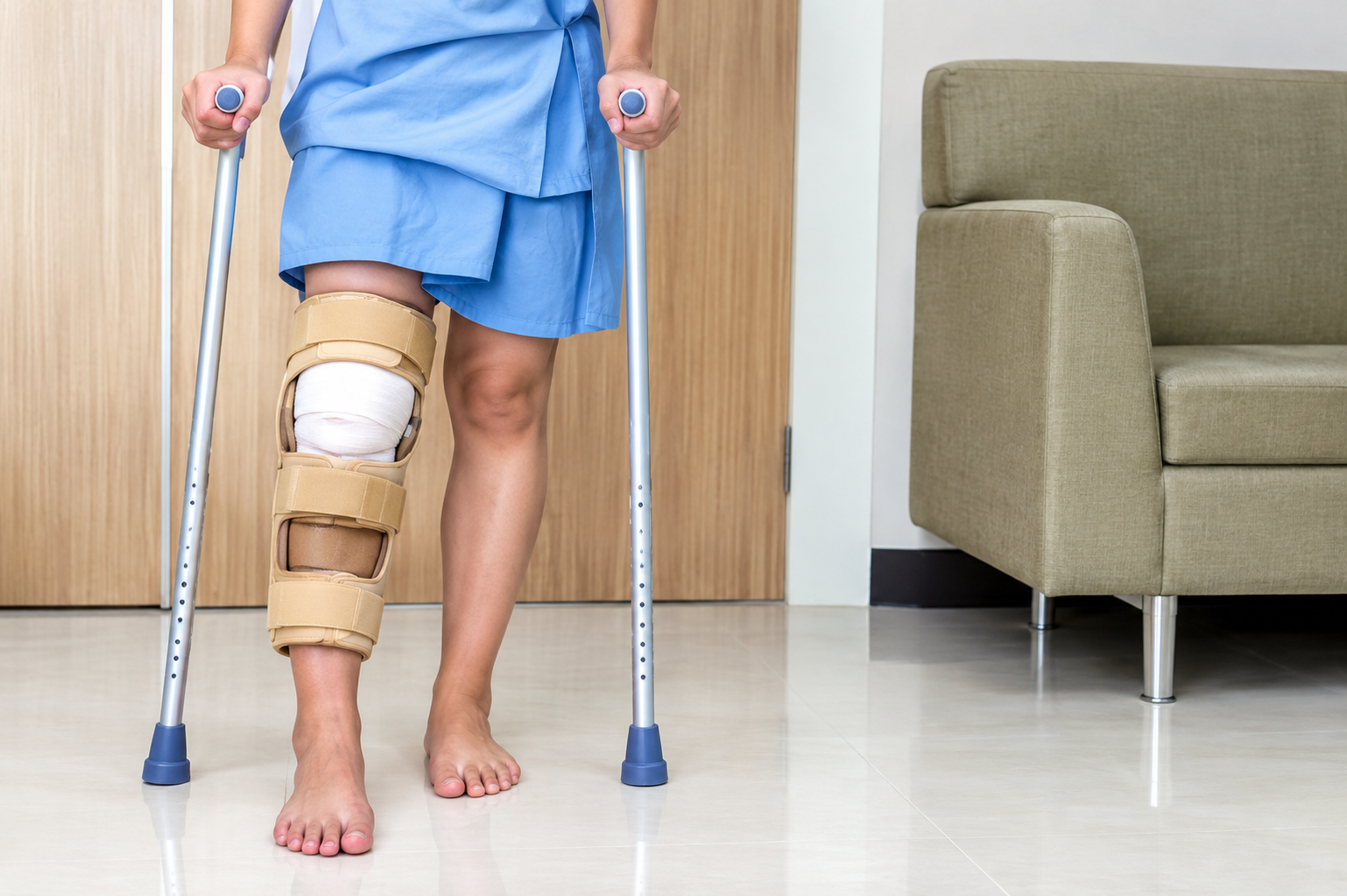 Rehabilitation with Knee Brace and Crutches